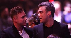 Olly Murs and Robbie Williams at the BRIT Awards