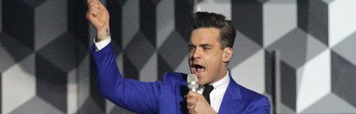 Robbie Williams live on satge at the BRIT Awards 2