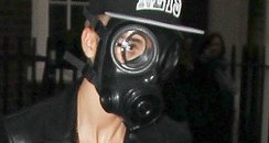 Justin Bieber wearing a gas mask