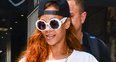 Rihanna wearing a white roman dress