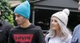 Zayn Malik and Perrie Edwards holding hands