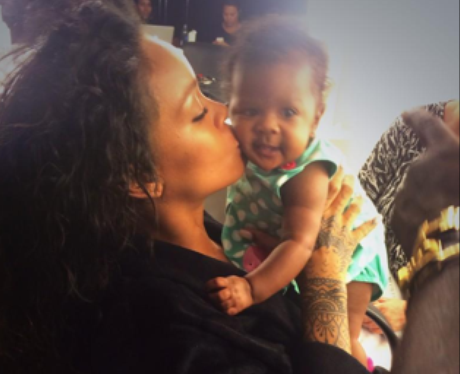 A Kiss For Riri's Niece! The Bajan Star Enjoys Some Quality Time With 