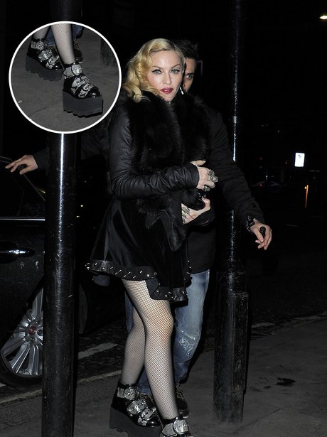 Yes! We're thinking the same thing... HOW does Madonna walk in those ...